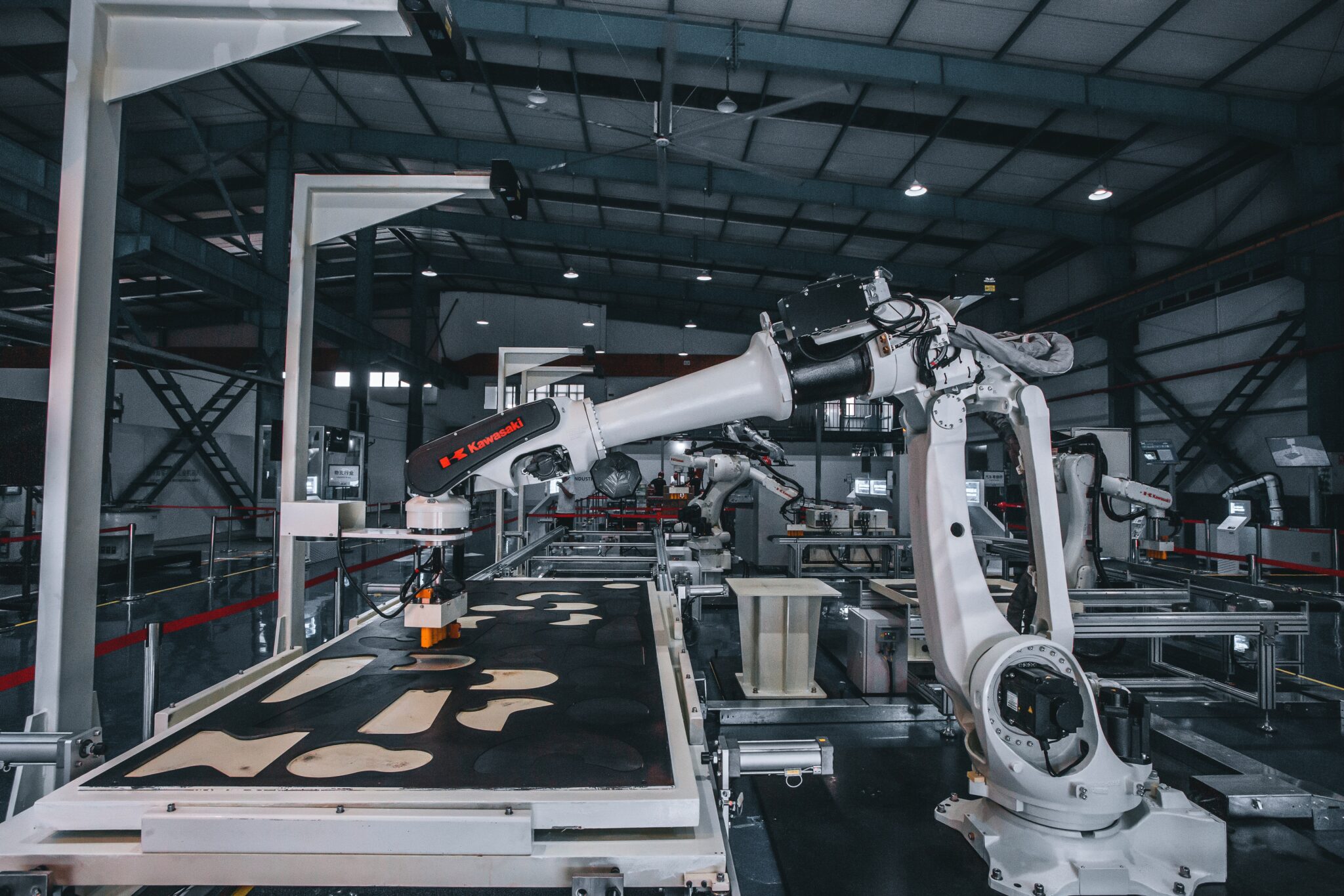 Robotic arm in a factory setting.