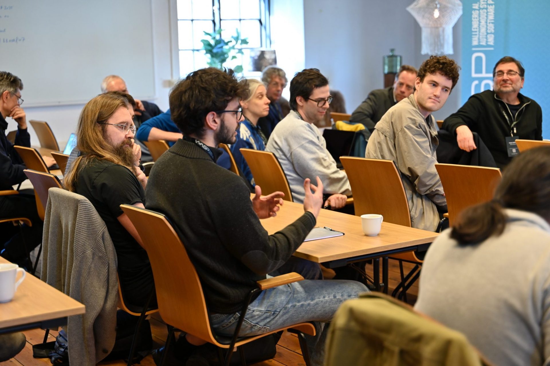 People talking during a conference by their table