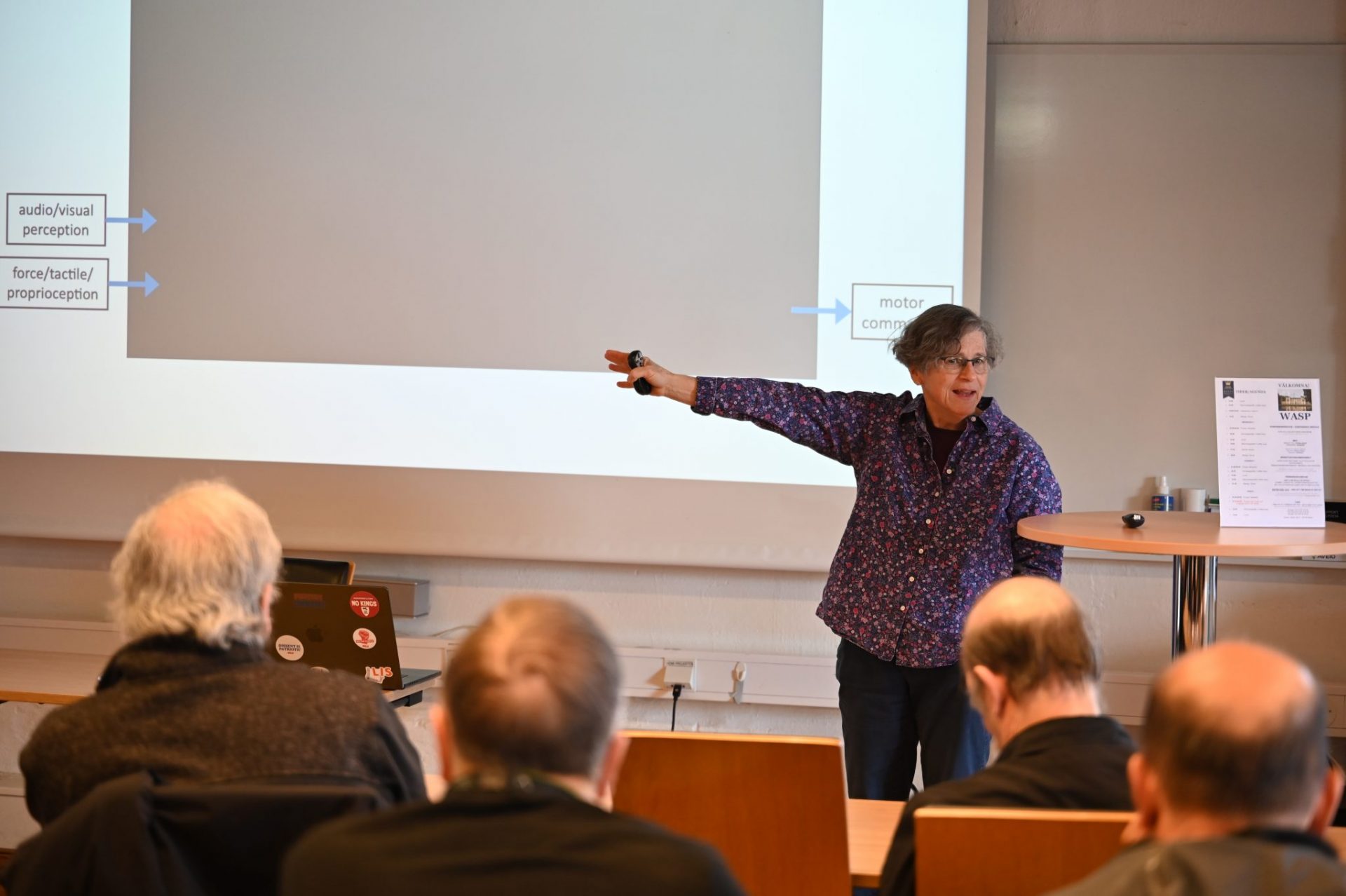 Woman talking in front of audience
