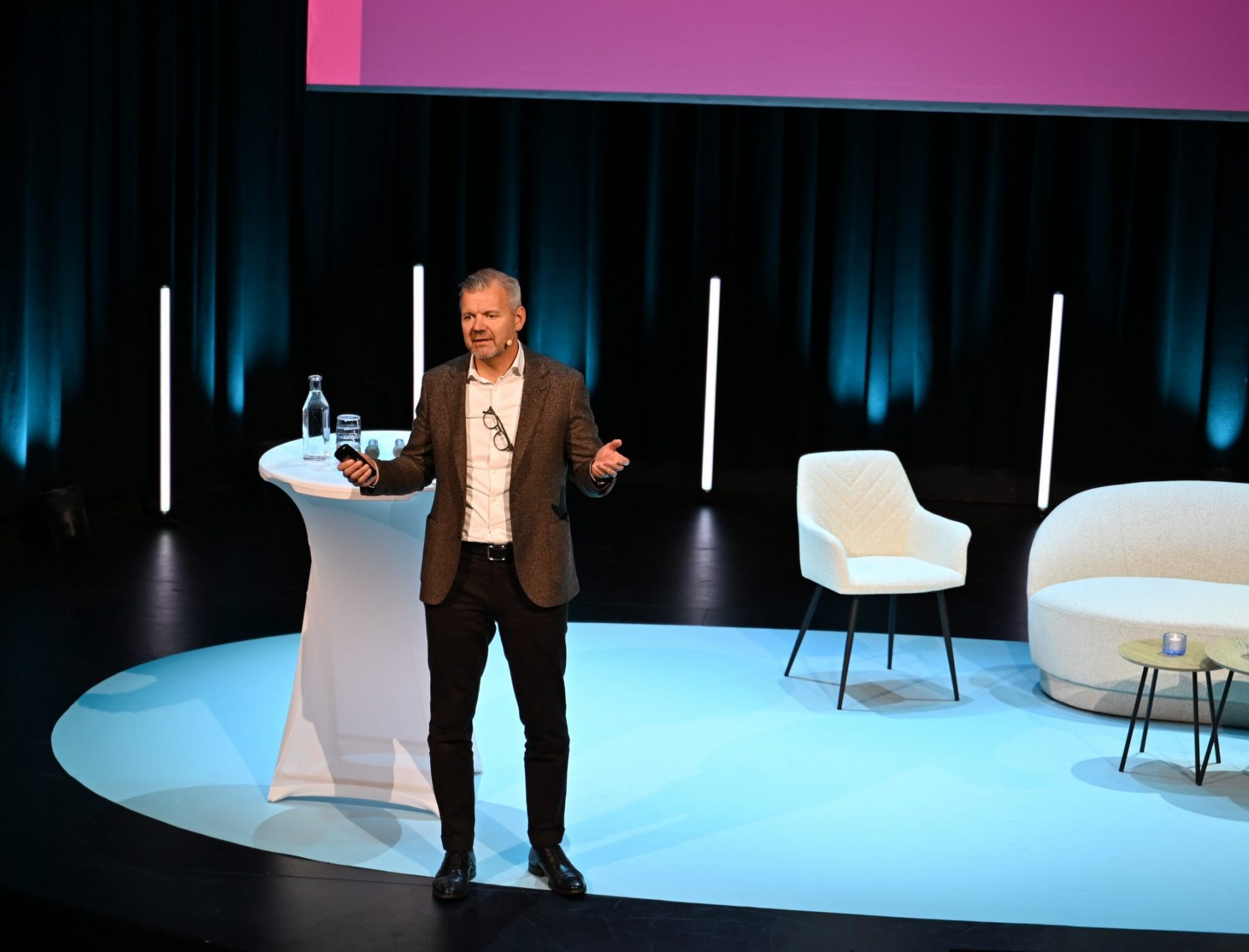 Man talking on stage