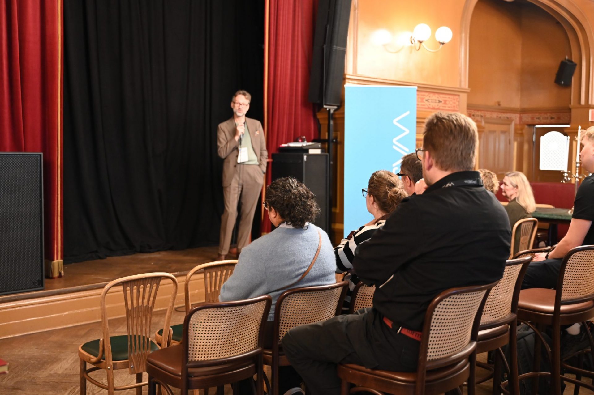 Man talking on stage