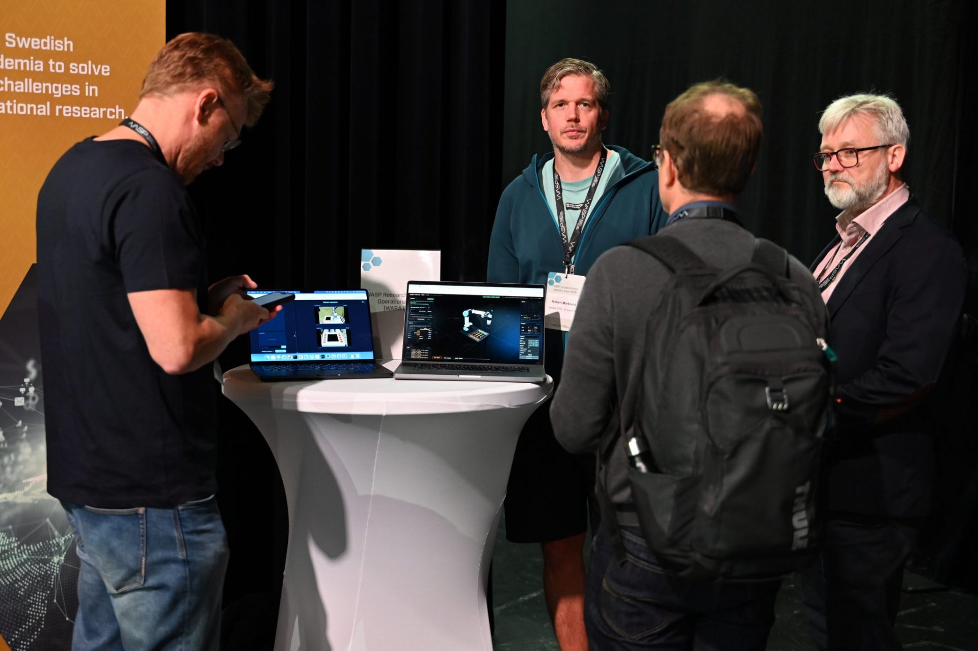 Four man in an exhibition