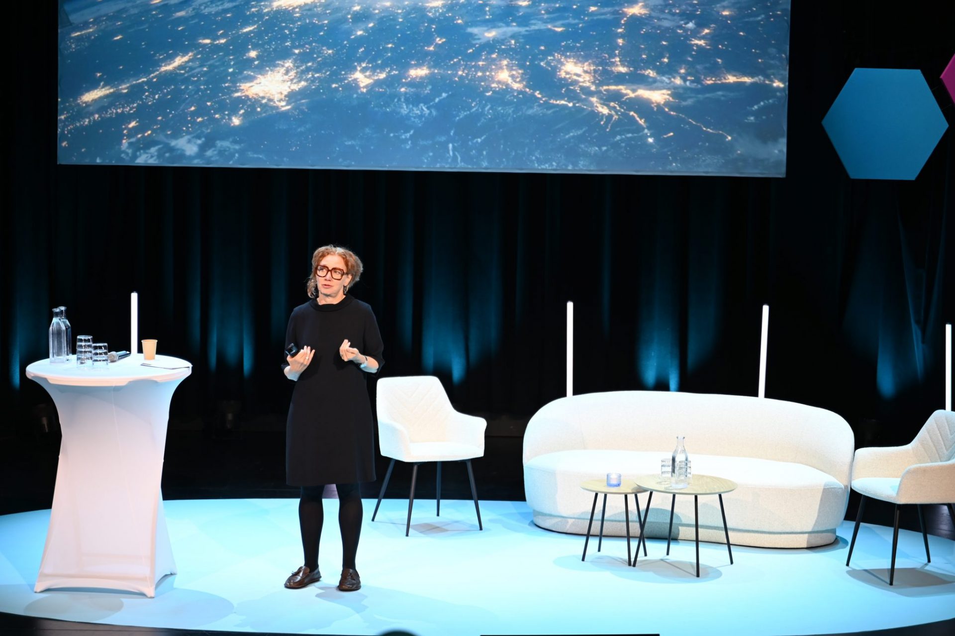Woman talking on stage