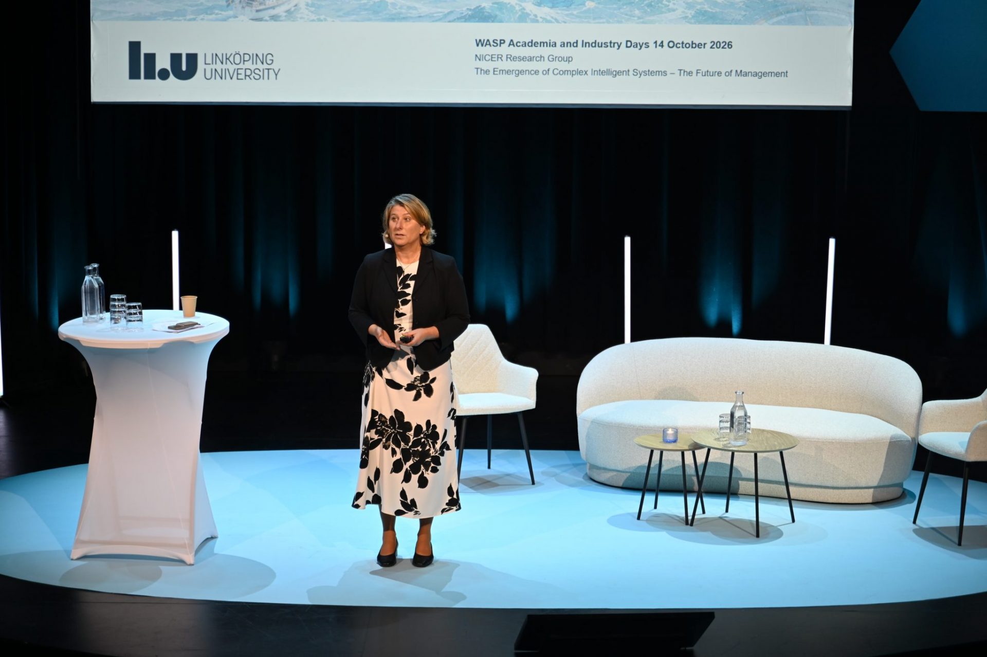 Woman talking on stage