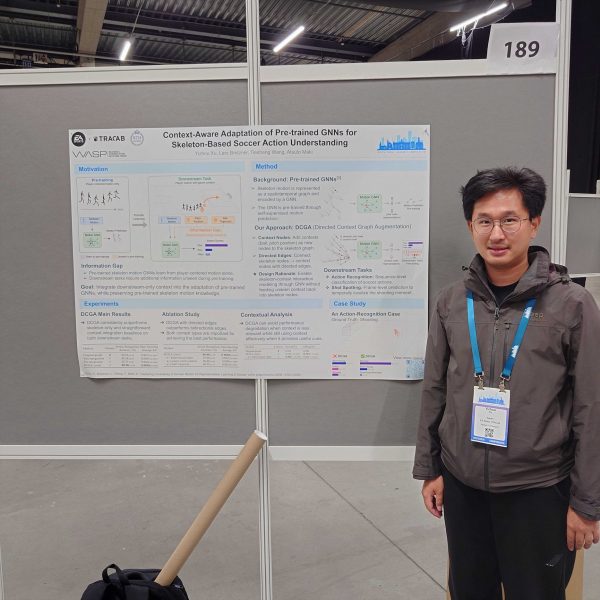 Man standing by a poster